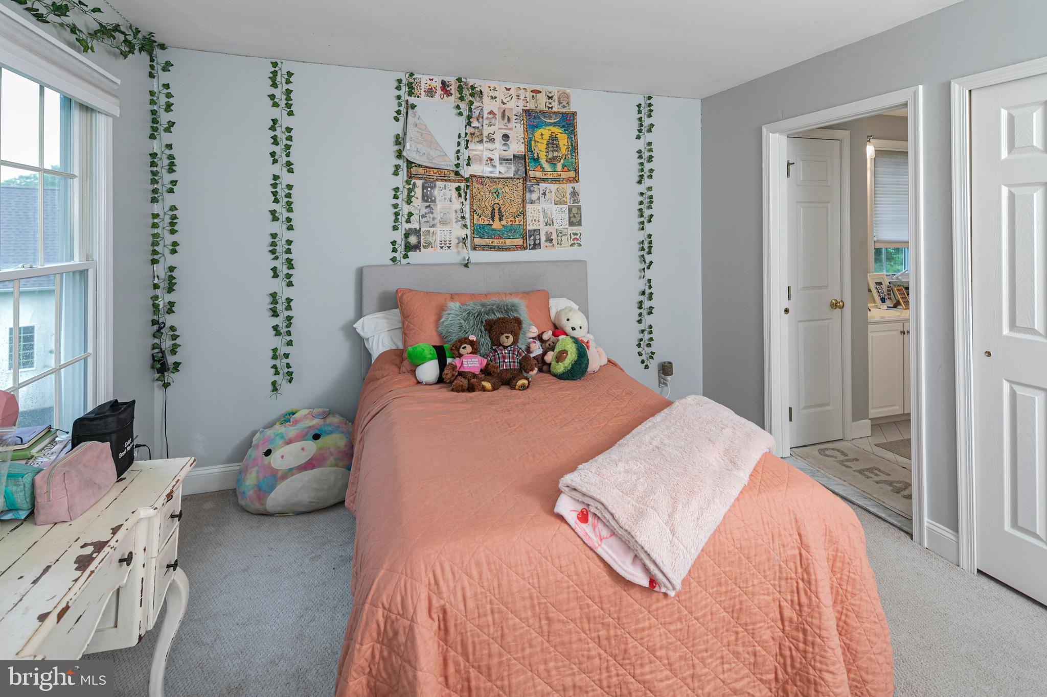 173 Christopher Drive Princeton, NJ 08540 - Photo 38 of 61 a bedroom with a bed and wooden floor