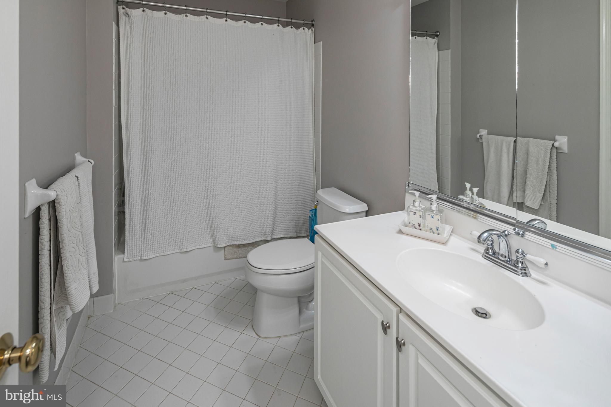 173 Christopher Drive Princeton, NJ 08540 - Photo 41 of 61 a bathroom with a sink toilet and shower