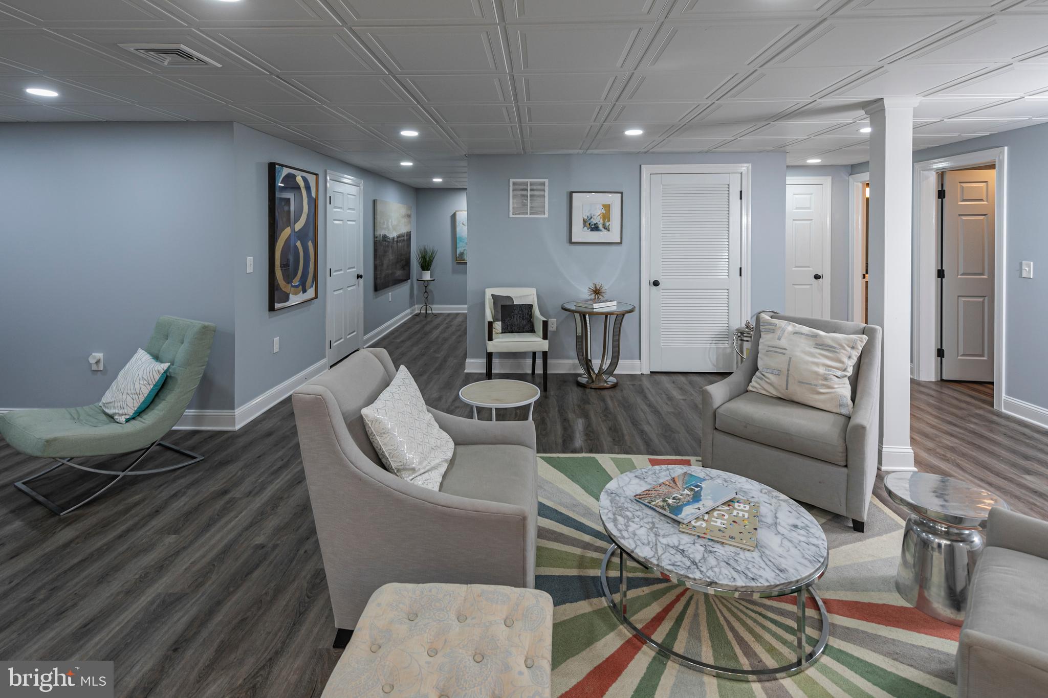173 Christopher Drive Princeton, NJ 08540 - Photo 46 of 61 a living room with furniture and a wooden floor
