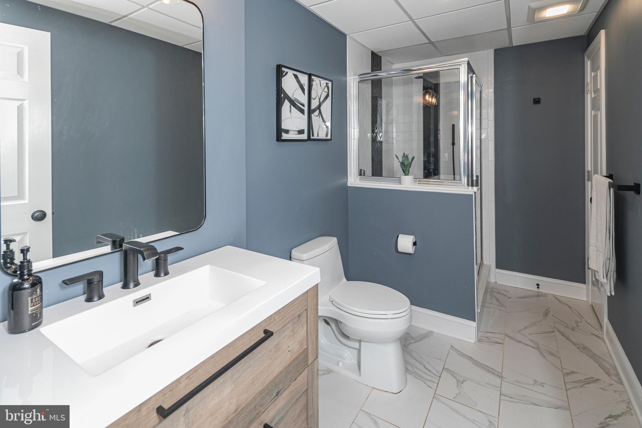 173 Christopher Drive Princeton, NJ 08540 - Photo 48 of 61 a bathroom with a sink toilet and shower