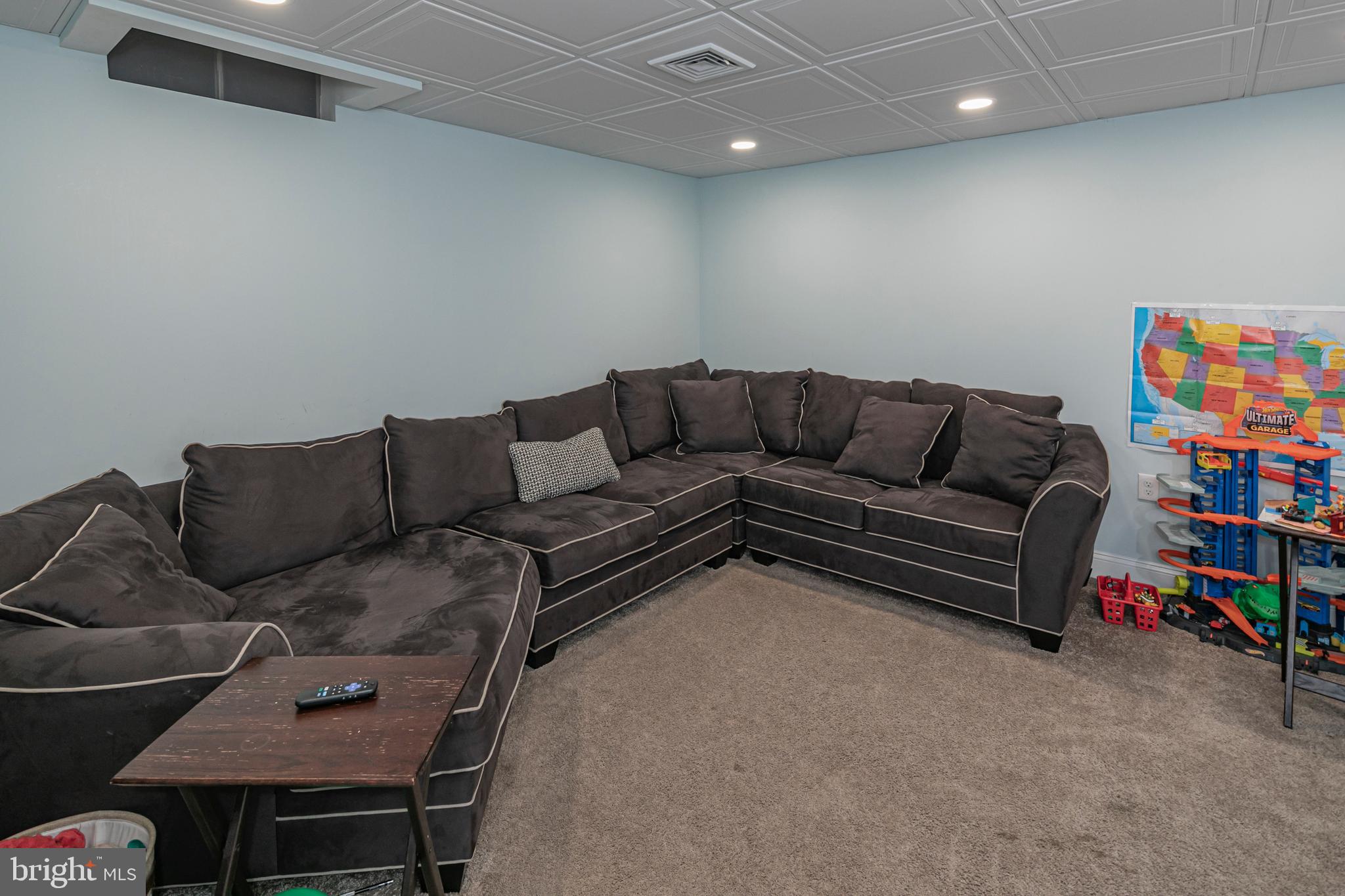 173 Christopher Drive Princeton, NJ 08540 - Photo 49 of 61 a living room with furniture and a couch