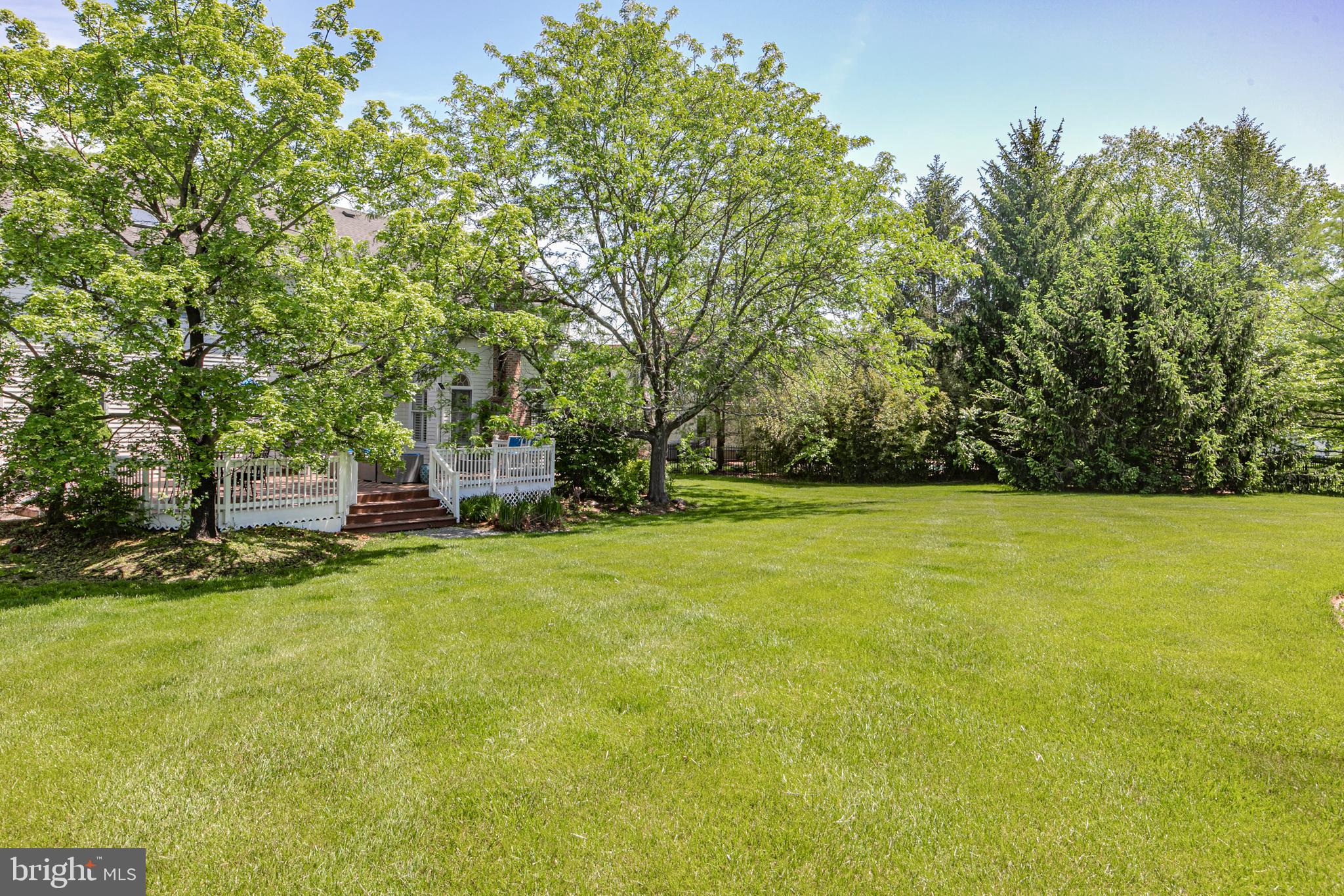 173 Christopher Drive Princeton, NJ 08540 - Photo 61 of 61 a view of a swimming pool and trees in the background