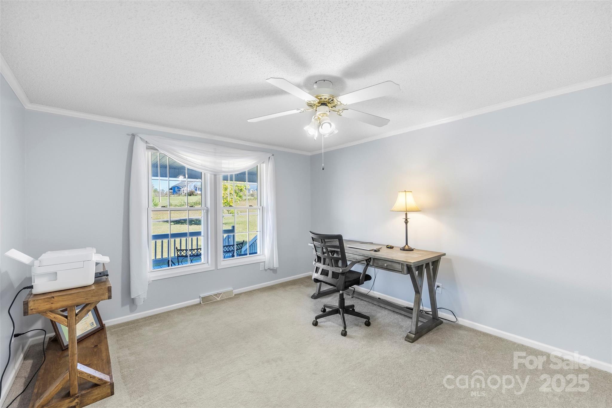 320 Huffstetler Lake Road Dallas, NC 28034 - Photo 26 of 47 a view of a workspace with furniture and a window