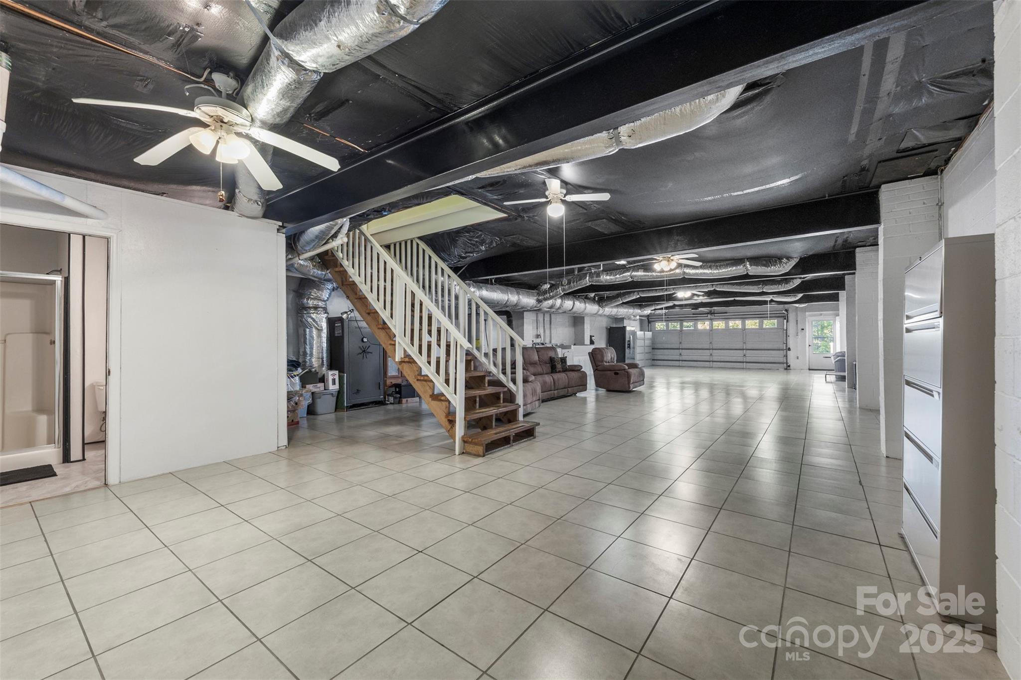 320 Huffstetler Lake Road Dallas, NC 28034 - Photo 29 of 47 a view of an empty room with wooden floor