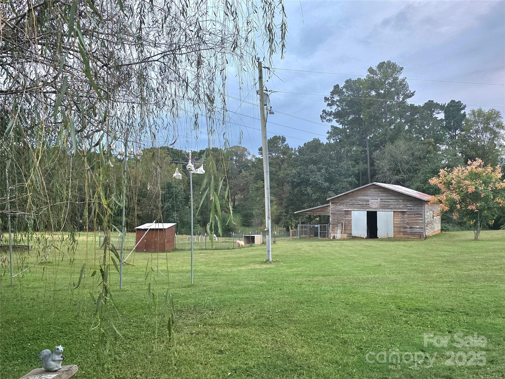 320 Huffstetler Lake Road Dallas, NC 28034 - Photo 32 of 47 a house view with a outdoor space