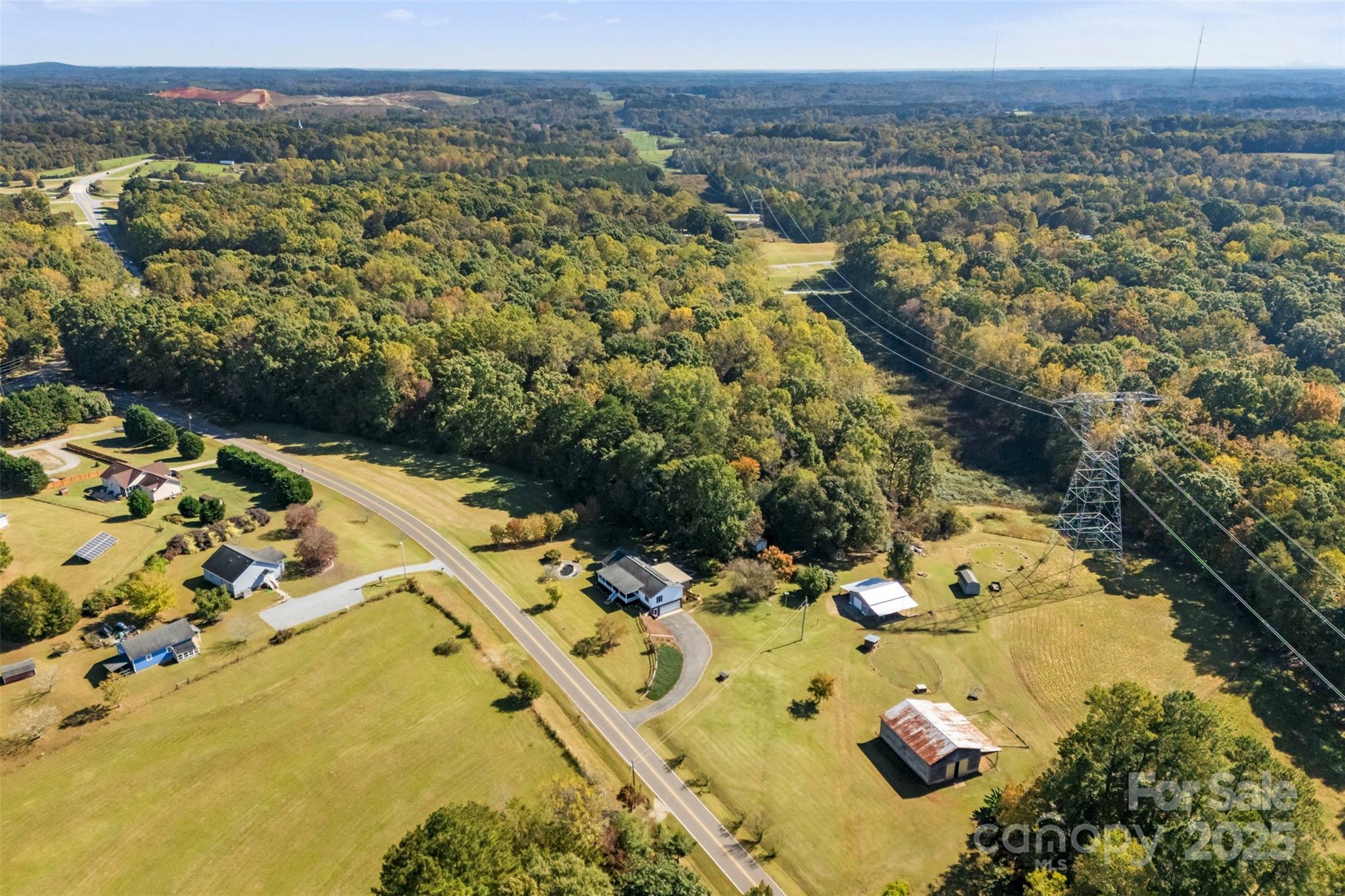 320 Huffstetler Lake Road Dallas, NC 28034 - Photo 41 of 47 an aerial view of a house with a yard