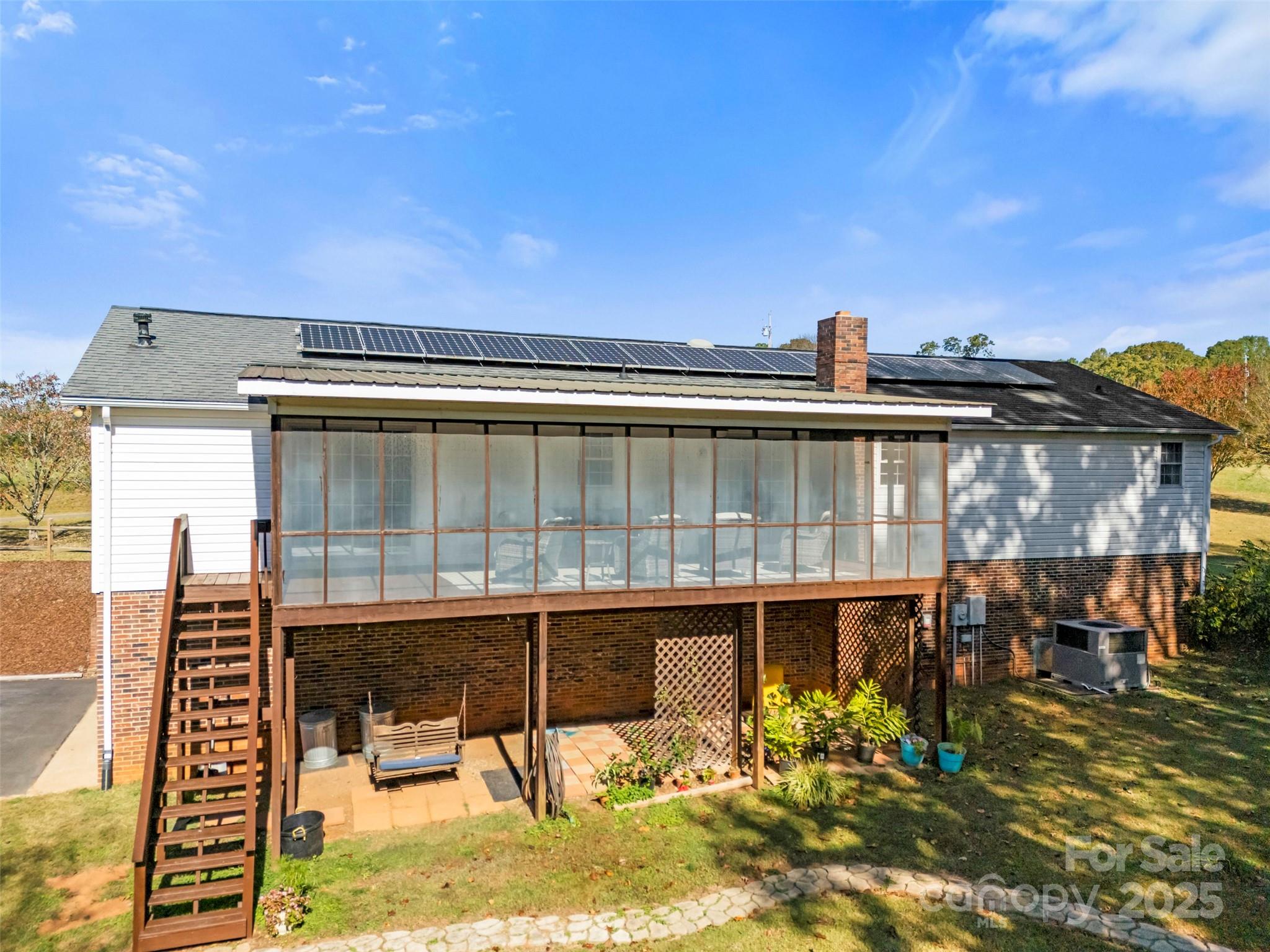 320 Huffstetler Lake Road Dallas, NC 28034 - Photo 46 of 47 a view of a balcony with chairs