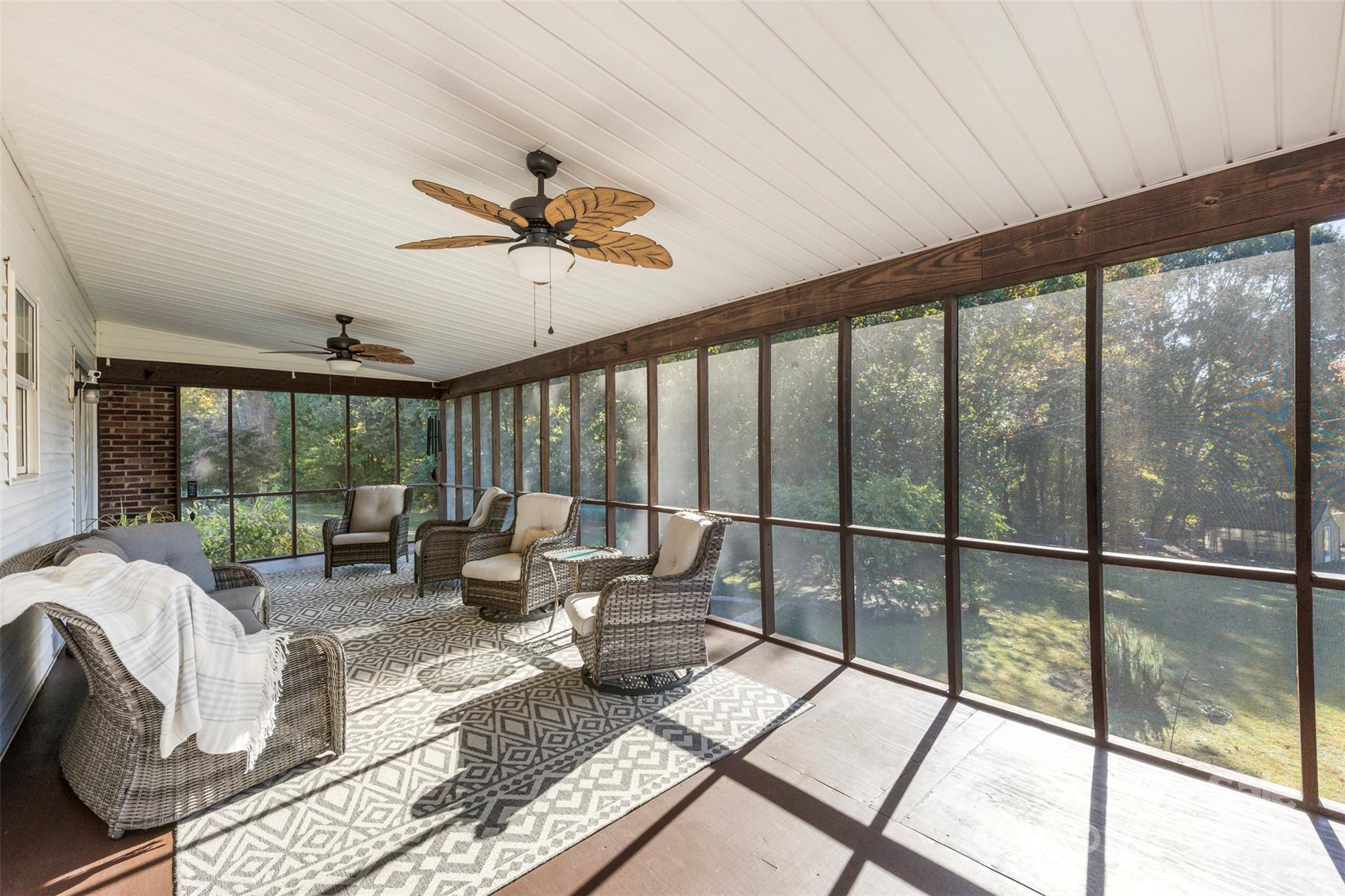 320 Huffstetler Lake Road Dallas, NC 28034 - Photo 5 of 47 a living room with furniture and a large window
