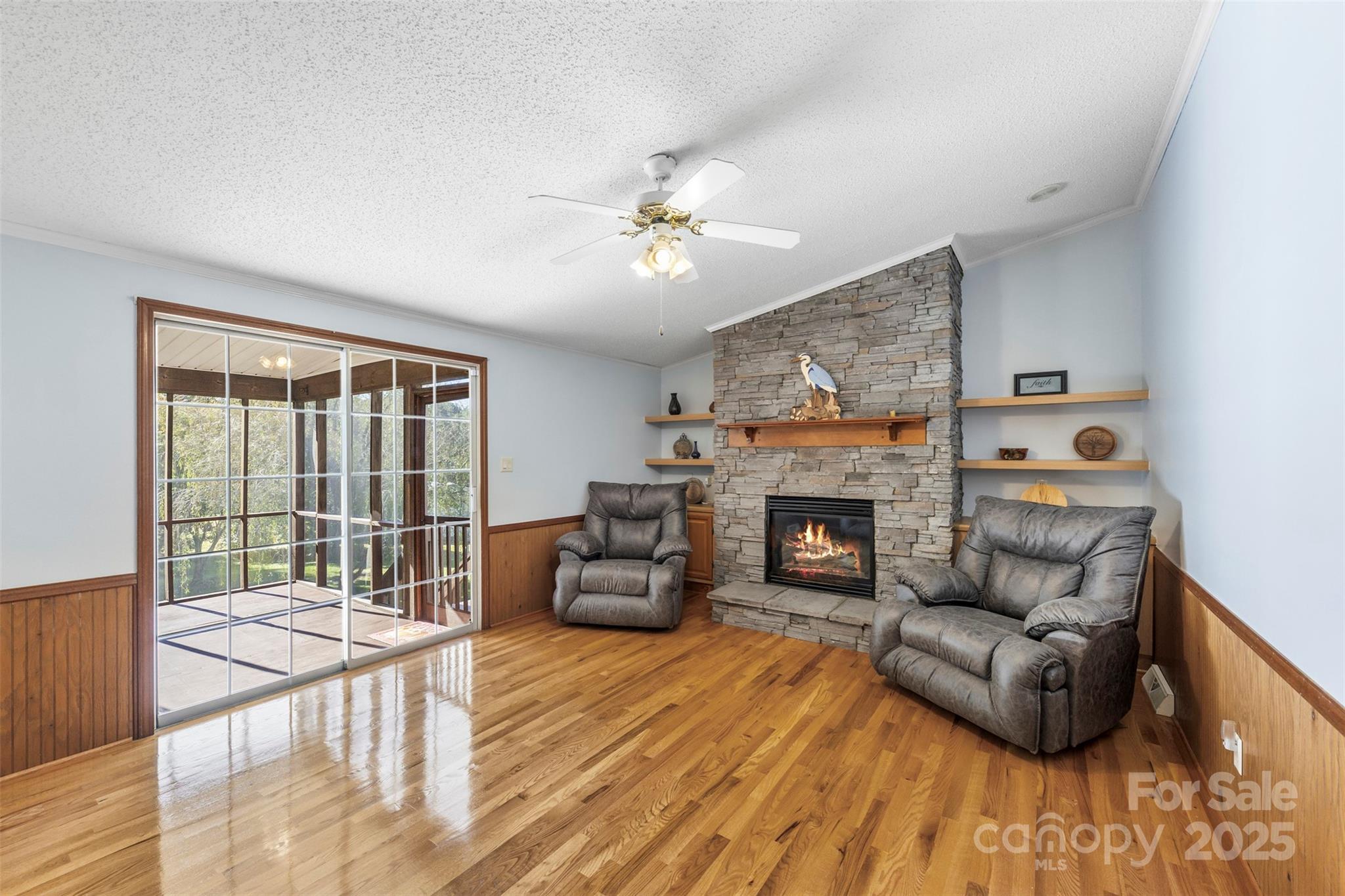 320 Huffstetler Lake Road Dallas, NC 28034 - Photo 7 of 47 a living room with furniture and a fireplace