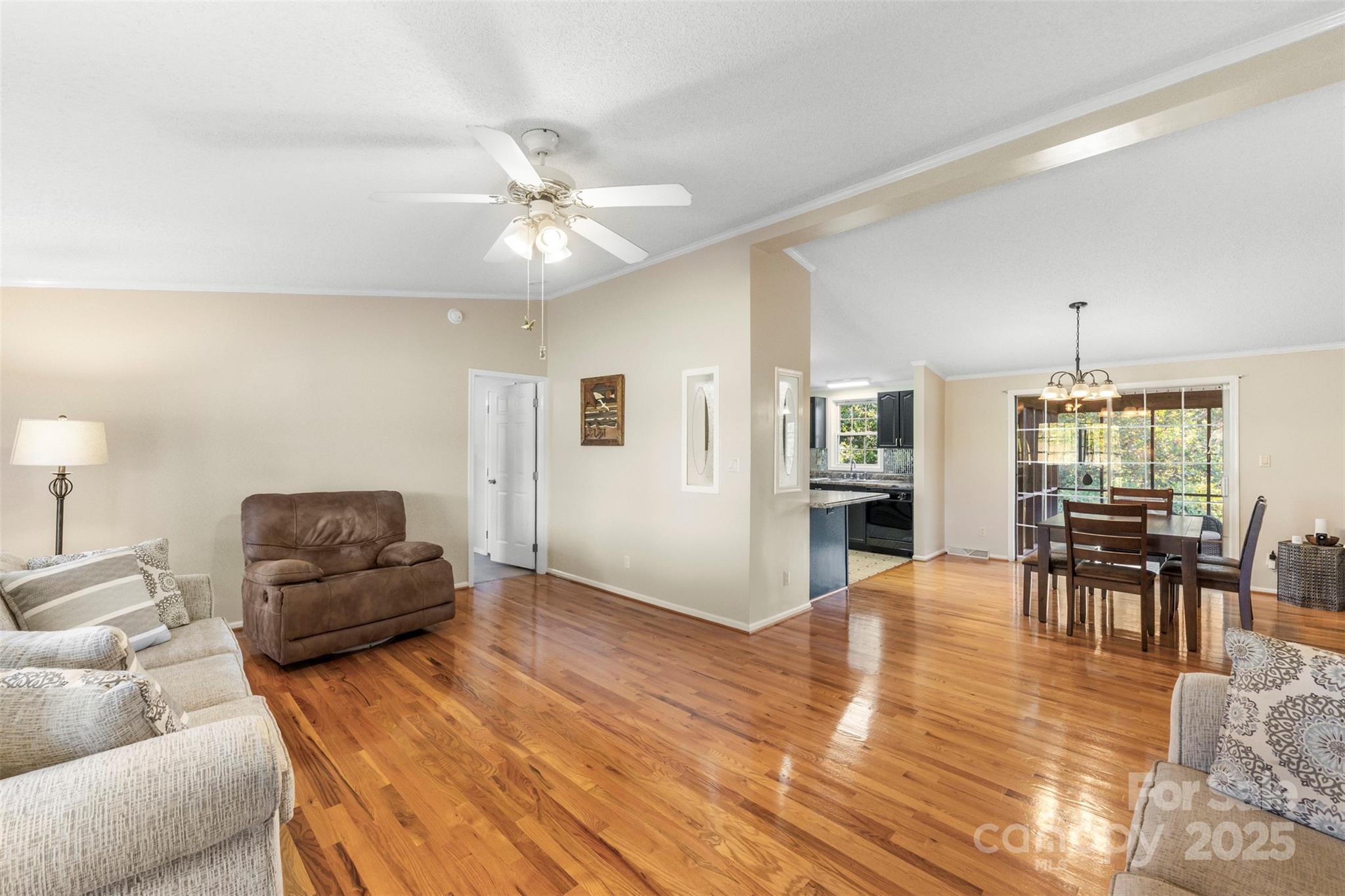 320 Huffstetler Lake Road Dallas, NC 28034 - Photo 10 of 47 a living room with furniture and wooden floor