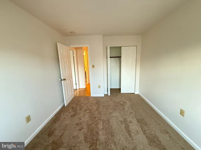 a car parked in front of a house