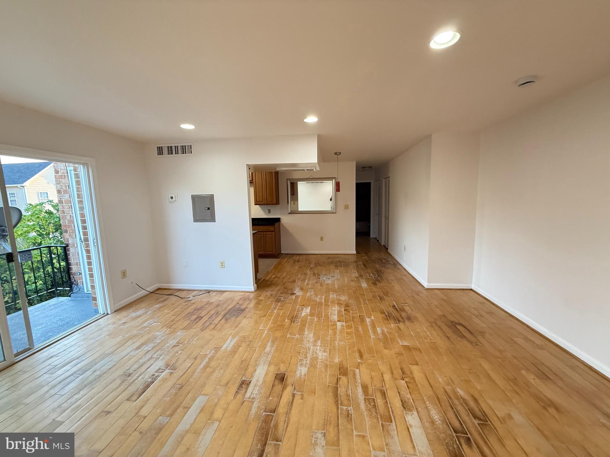 5009 D Street Southeast, Unit 303 Washington, DC 20019 - Photo 7 of 25 a view of empty room with wooden floor