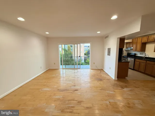 a view of a room that has a window