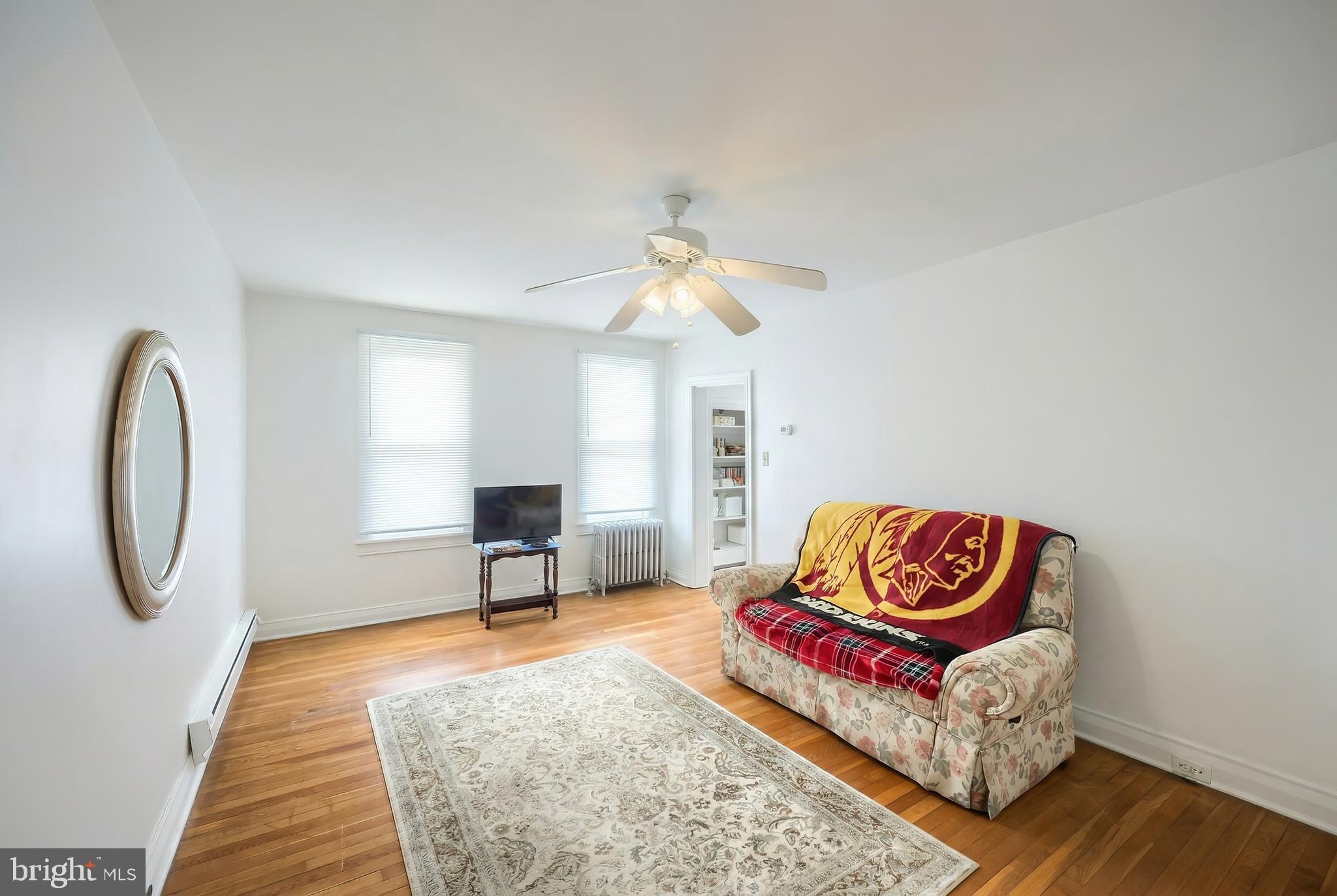 117 Baltimore Street Hanover, PA 17331 - Photo 22 of 37 a living room with furniture and a wooden floor