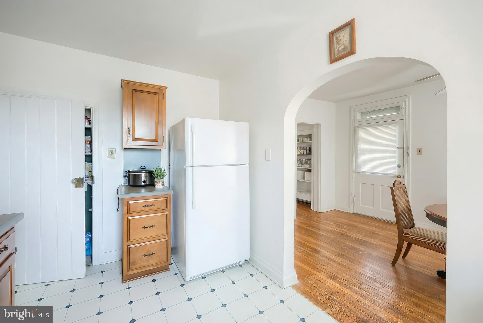 117 Baltimore Street Hanover, PA 17331 - Photo 27 of 37 a room with furniture a refrigerator and a stove