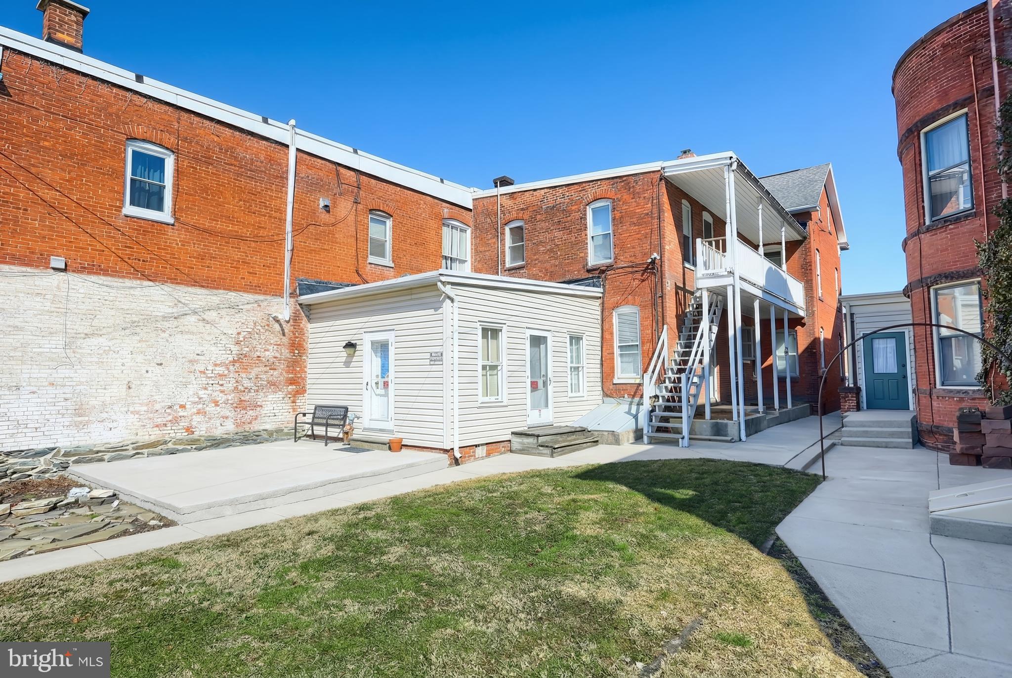 117 Baltimore Street Hanover, PA 17331 - Photo 8 of 37 a front view of a house with a yard