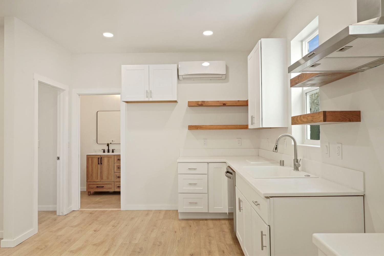 1269 B Street Walnut Grove, CA 95690 - Photo 13 of 42 a bathroom with a sink a toilet and shower
