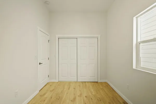 a front view of a house with a garage