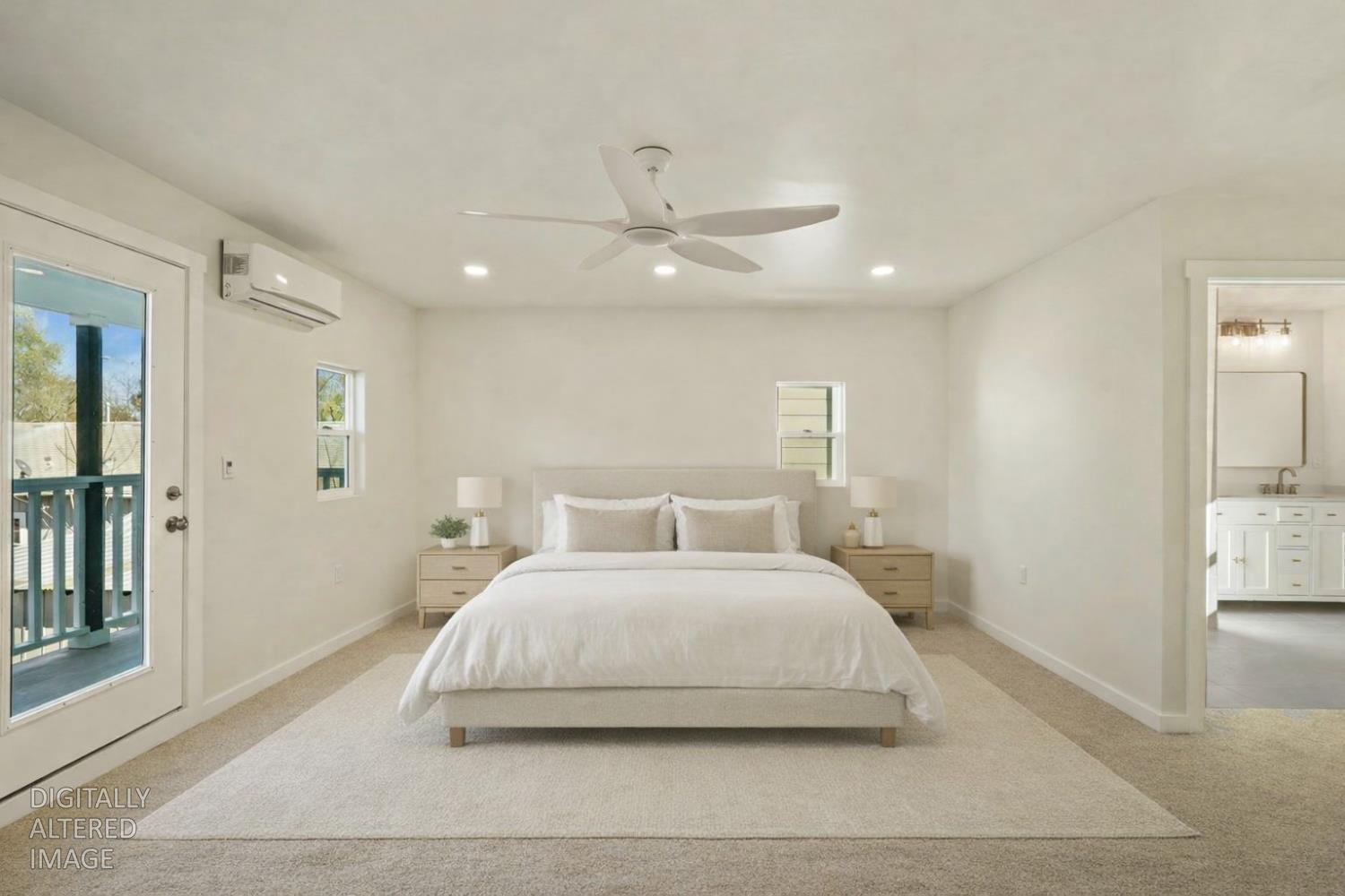 1269 B Street Walnut Grove, CA 95690 - Photo 26 of 42 a bedroom with a large bed and a chandelier