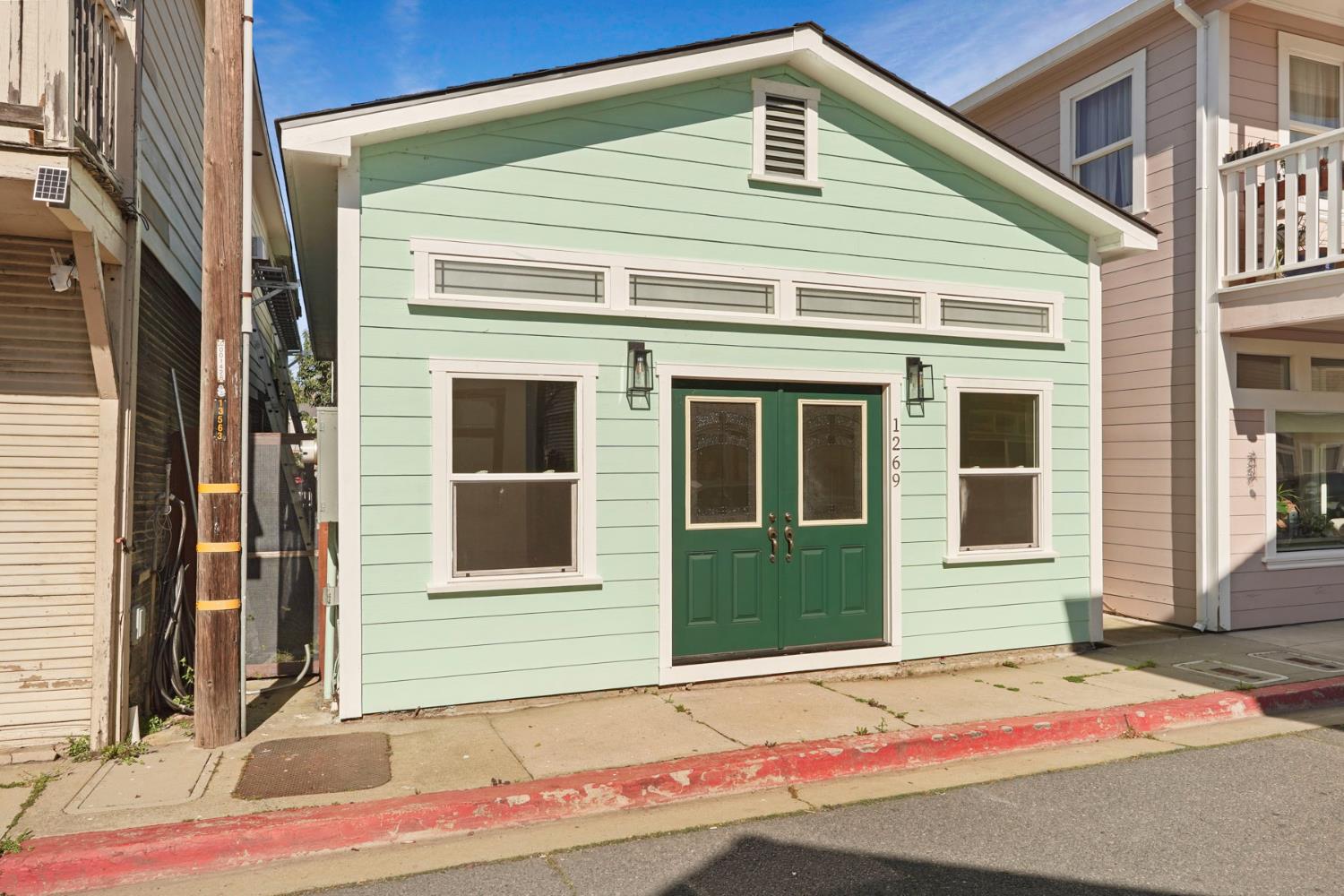1269 B Street Walnut Grove, CA 95690 - Photo 39 of 42 a front view of a house with a garage