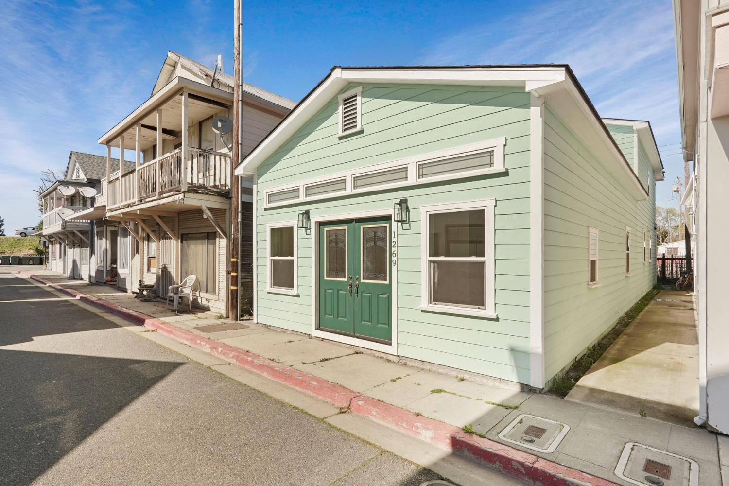 1269 B Street Walnut Grove, CA 95690 - Photo 41 of 42 a front view of a house with a yard