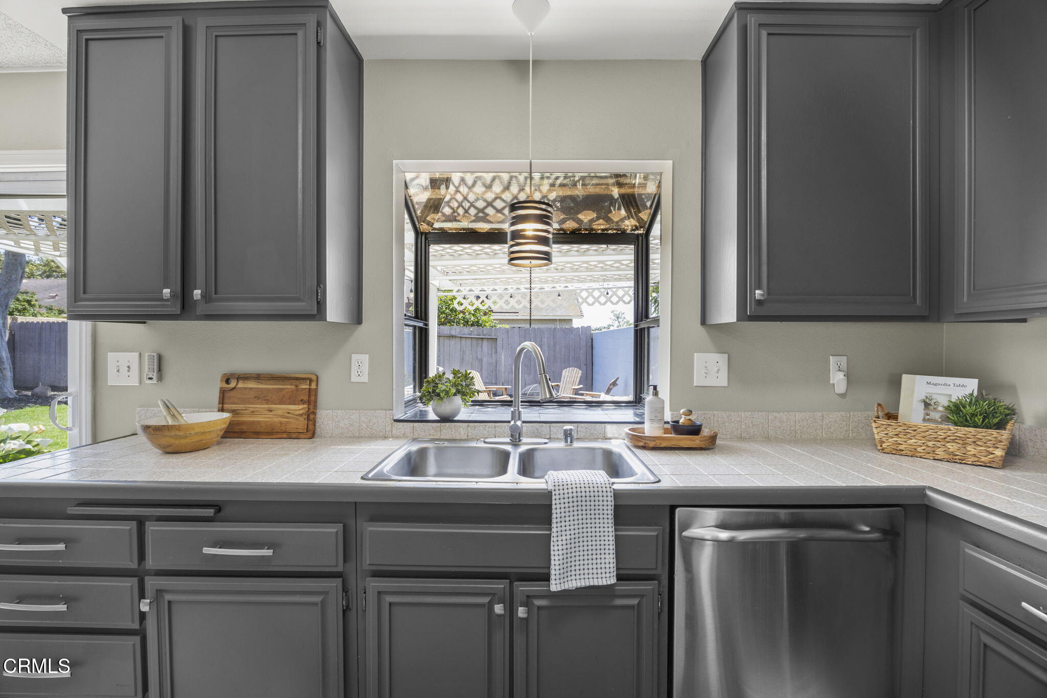 2730 Oarfish Lane Oxnard, CA 93035 - Photo 12 of 49 a kitchen with a sink and cabinets