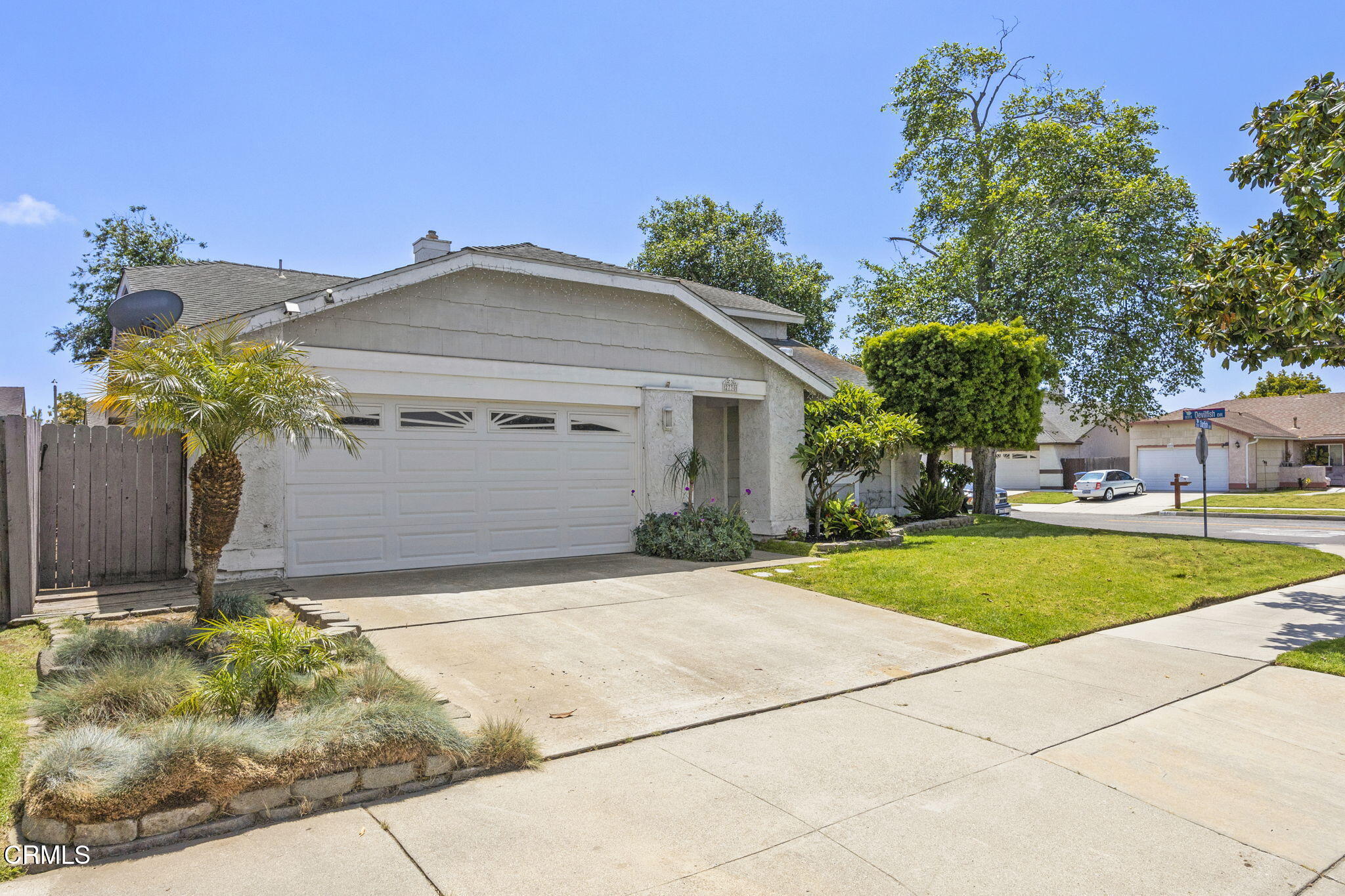 2730 Oarfish Lane Oxnard, CA 93035 - Photo 2 of 49 front view of a house with a yard