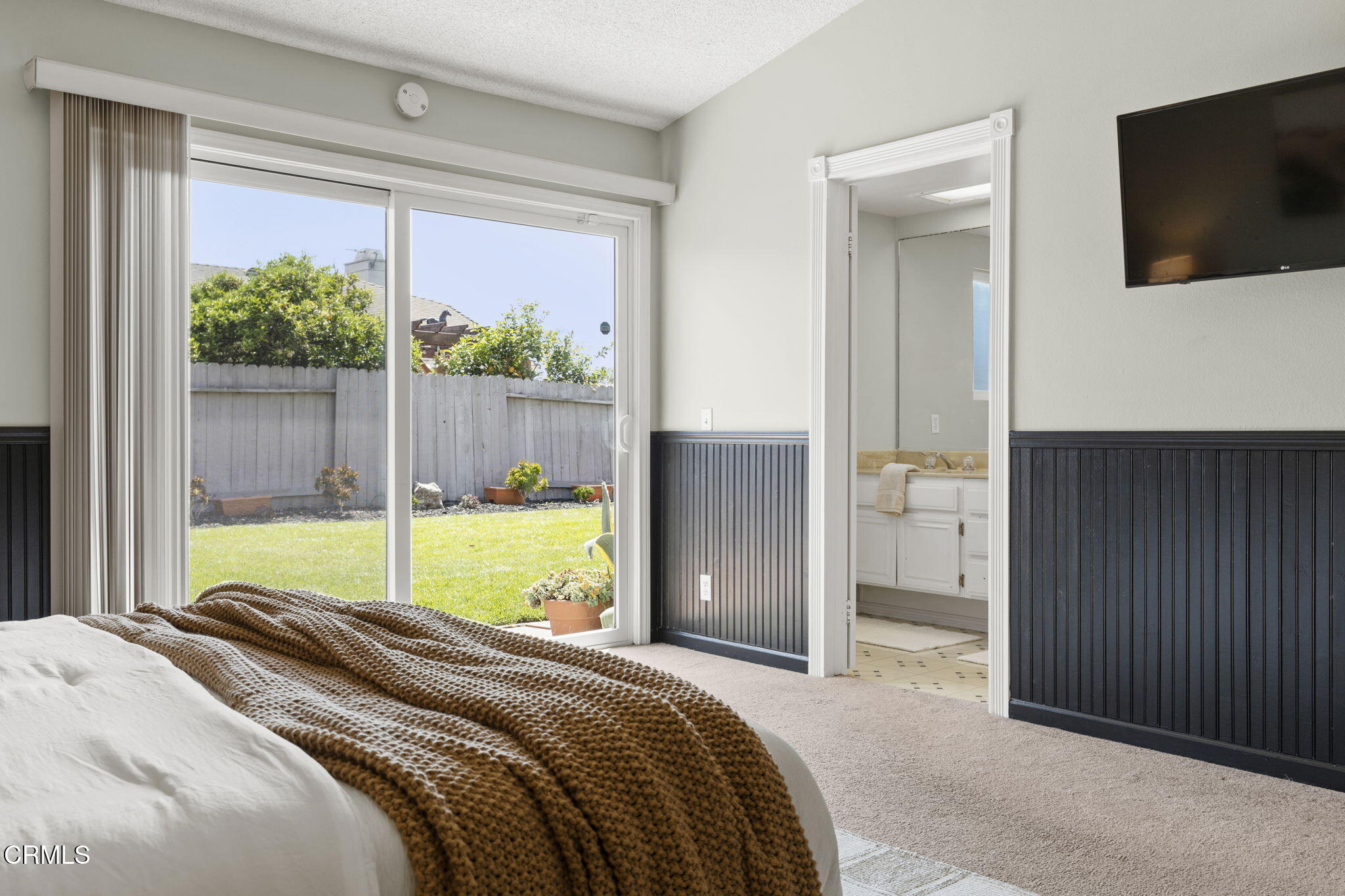 2730 Oarfish Lane Oxnard, CA 93035 - Photo 23 of 49 a bed sitting in a bedroom next to a window