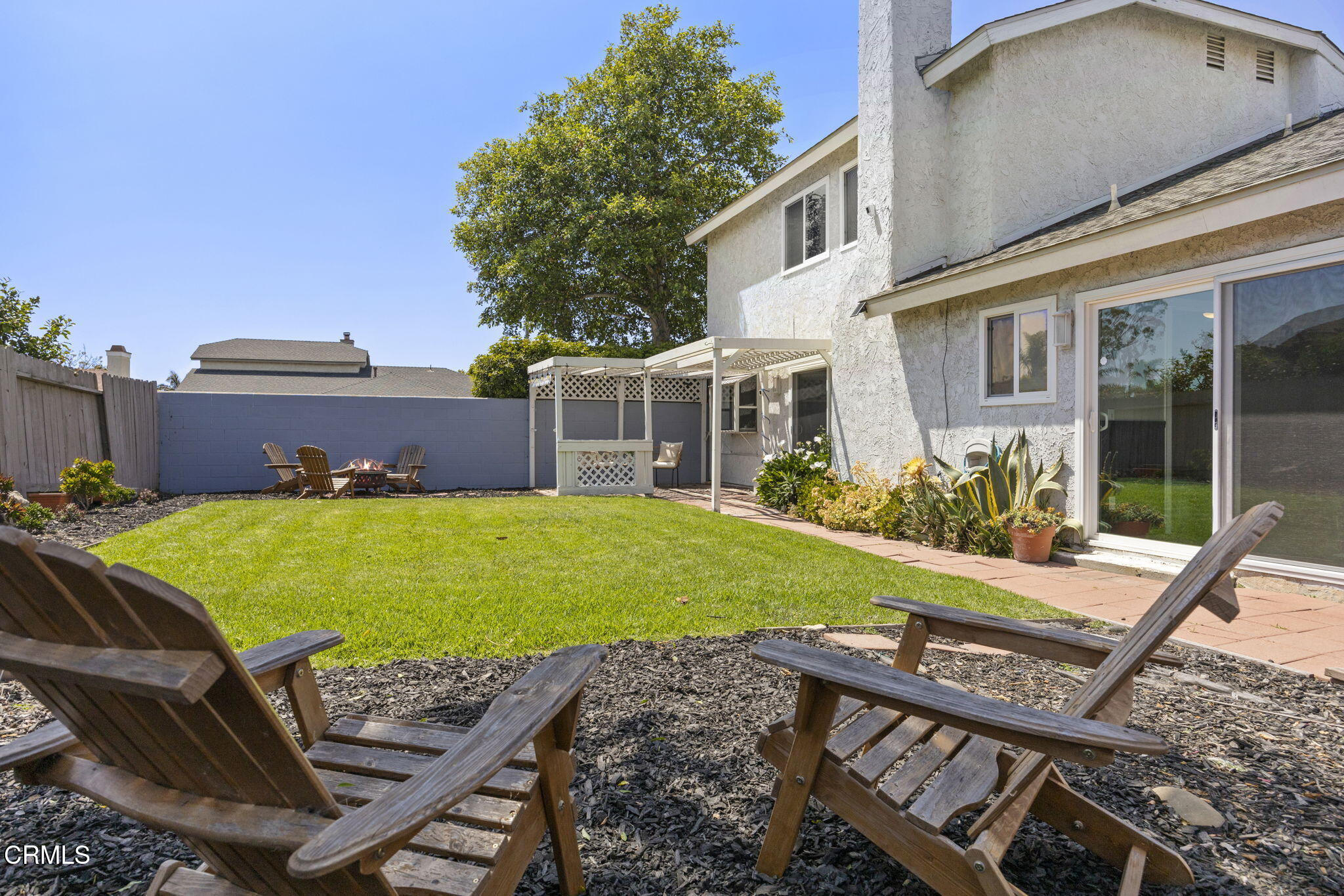 2730 Oarfish Lane Oxnard, CA 93035 - Photo 41 of 49 a view of a patio with chairs and a table
