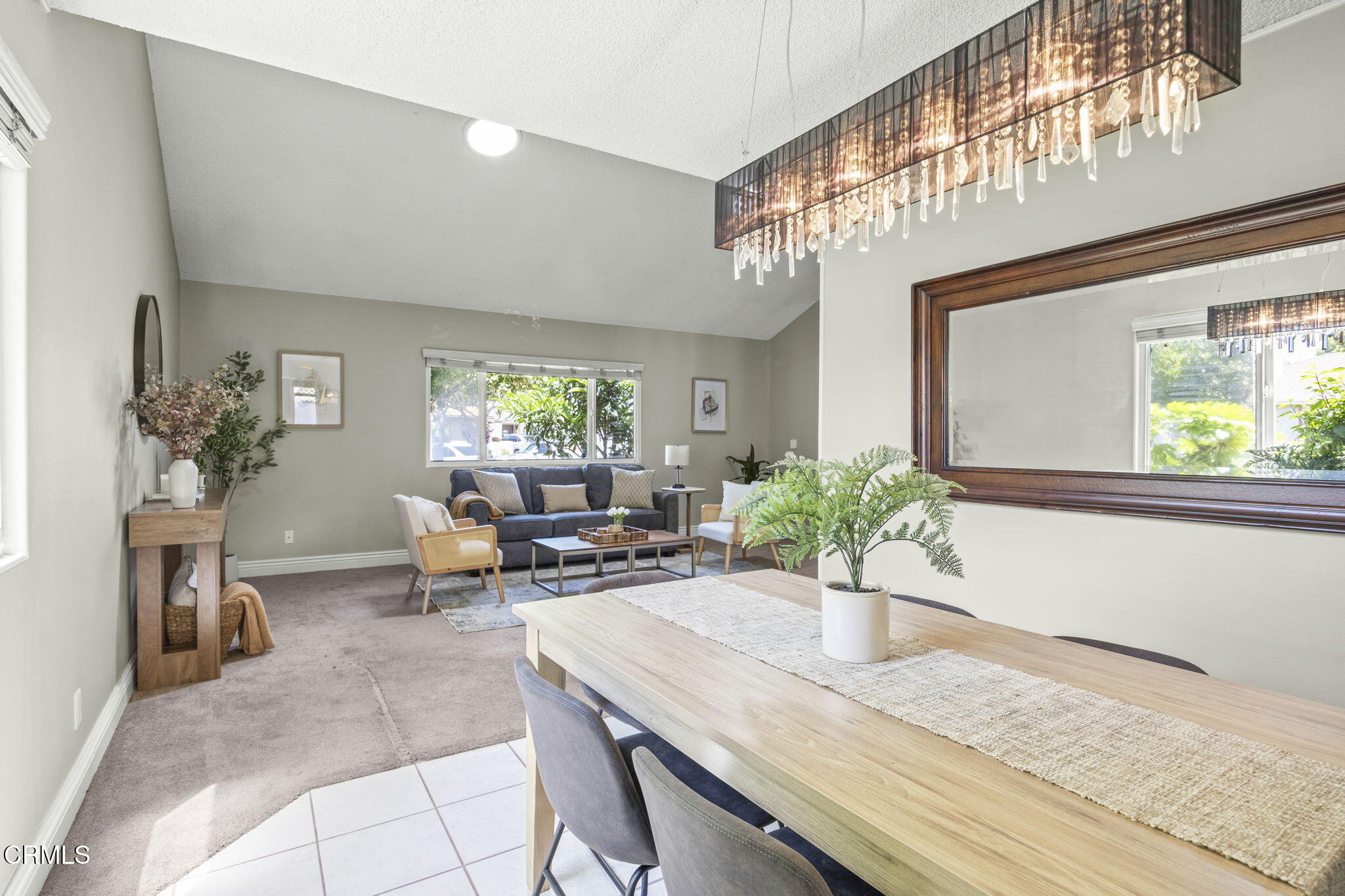 2730 Oarfish Lane Oxnard, CA 93035 - Photo 10 of 49 a living room with furniture and a chandelier