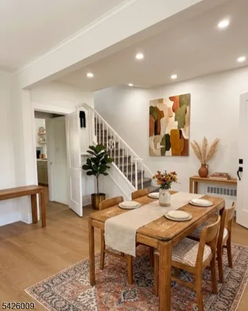 a view of a dining room with furniture