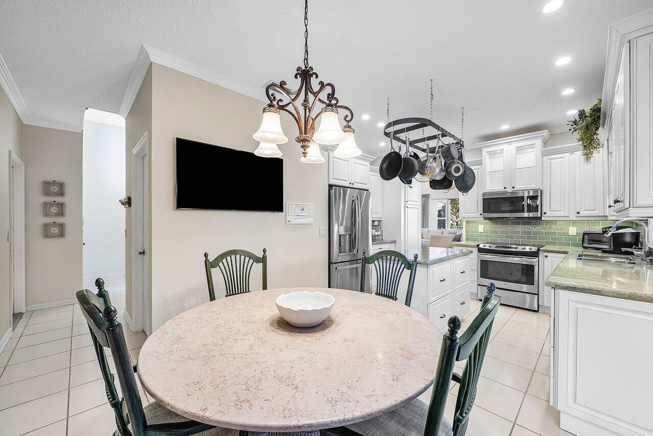 7155 Via Palomar Boca Raton, FL 33433 - Photo 13 of 45 a view of a dining room with furniture
