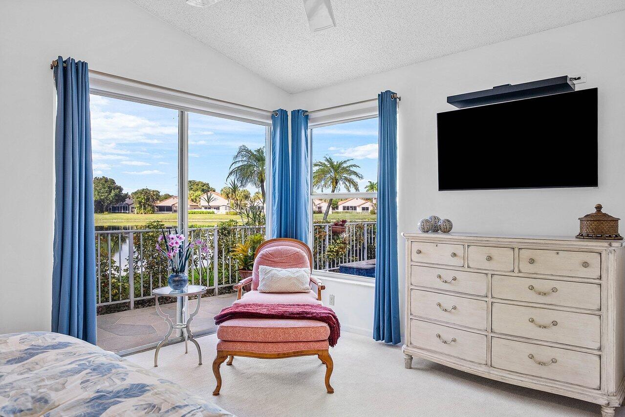 7155 Via Palomar Boca Raton, FL 33433 - Photo 19 of 45 a living room with furniture and a flat screen tv
