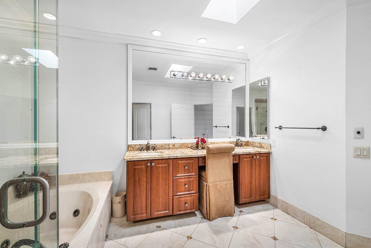 7155 Via Palomar Boca Raton, FL 33433 - Photo 21 of 45 a bathroom with a sink a vanity and a mirror