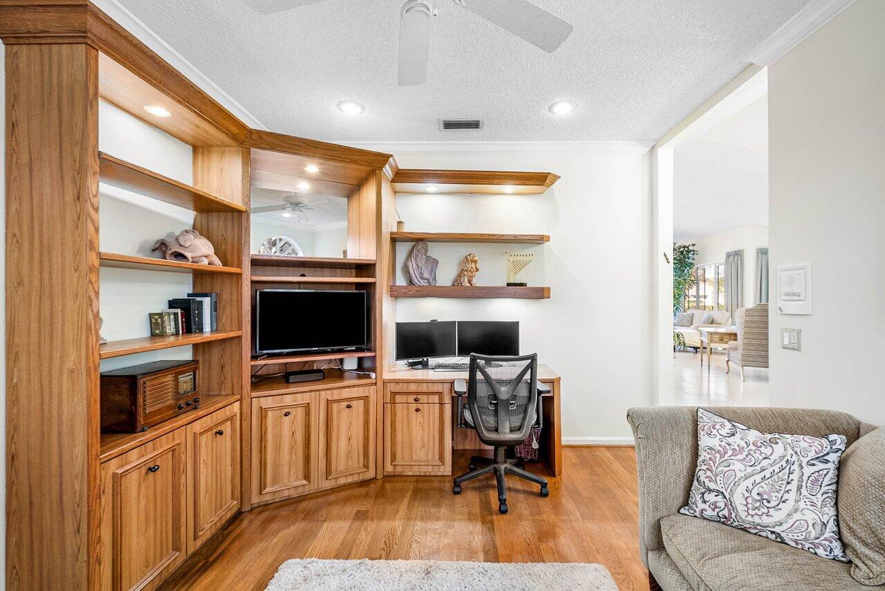 7155 Via Palomar Boca Raton, FL 33433 - Photo 23 of 45 a view of a workspace with furniture and a window