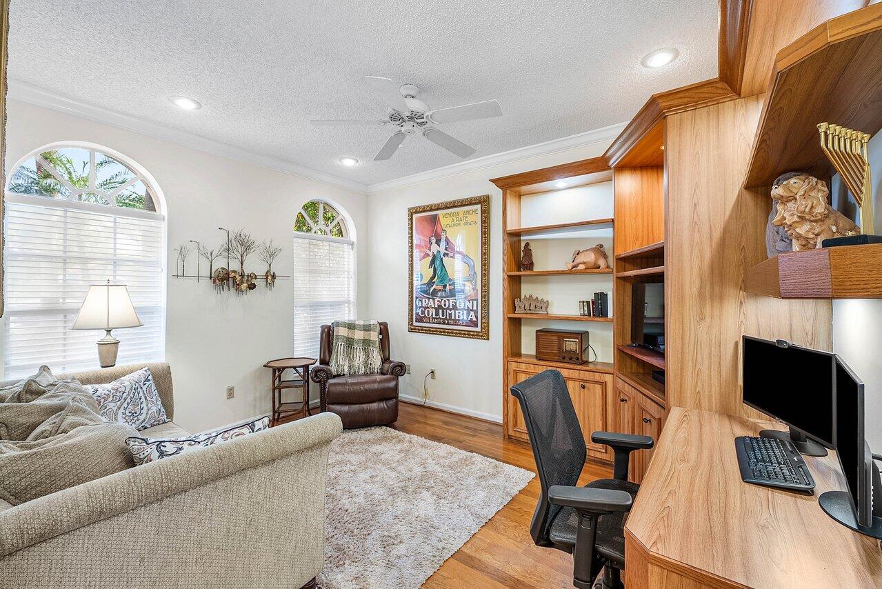 7155 Via Palomar Boca Raton, FL 33433 - Photo 24 of 45 a living room with furniture and a flat screen tv