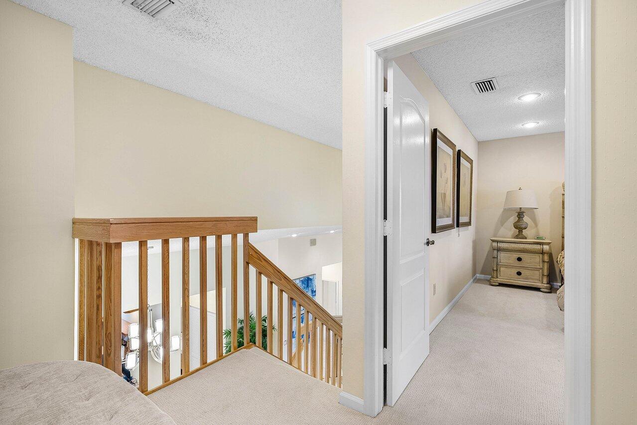 7155 Via Palomar Boca Raton, FL 33433 - Photo 30 of 45 a view of a hallway with a livingroom and a couch