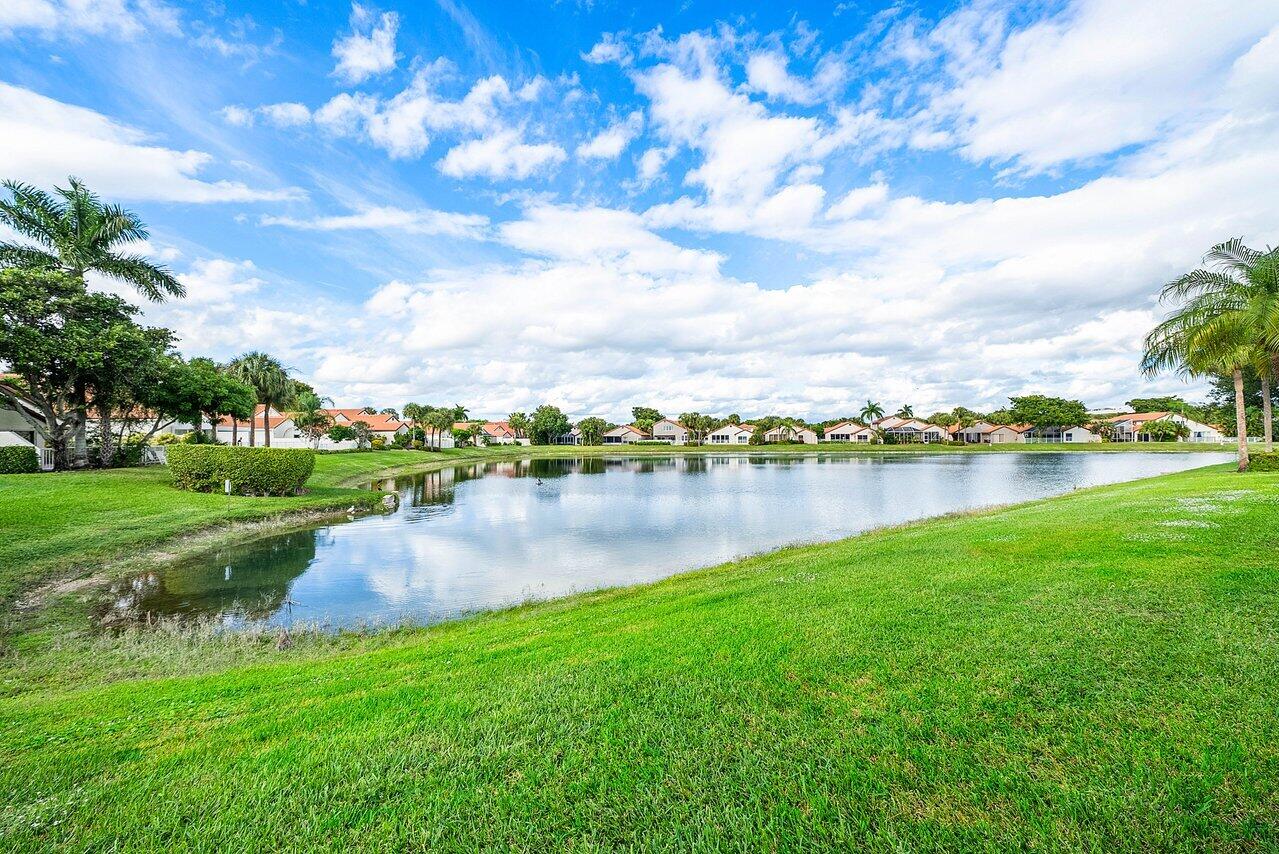 7155 Via Palomar Boca Raton, FL 33433 - Photo 37 of 45 a view of a lake with houses in the back