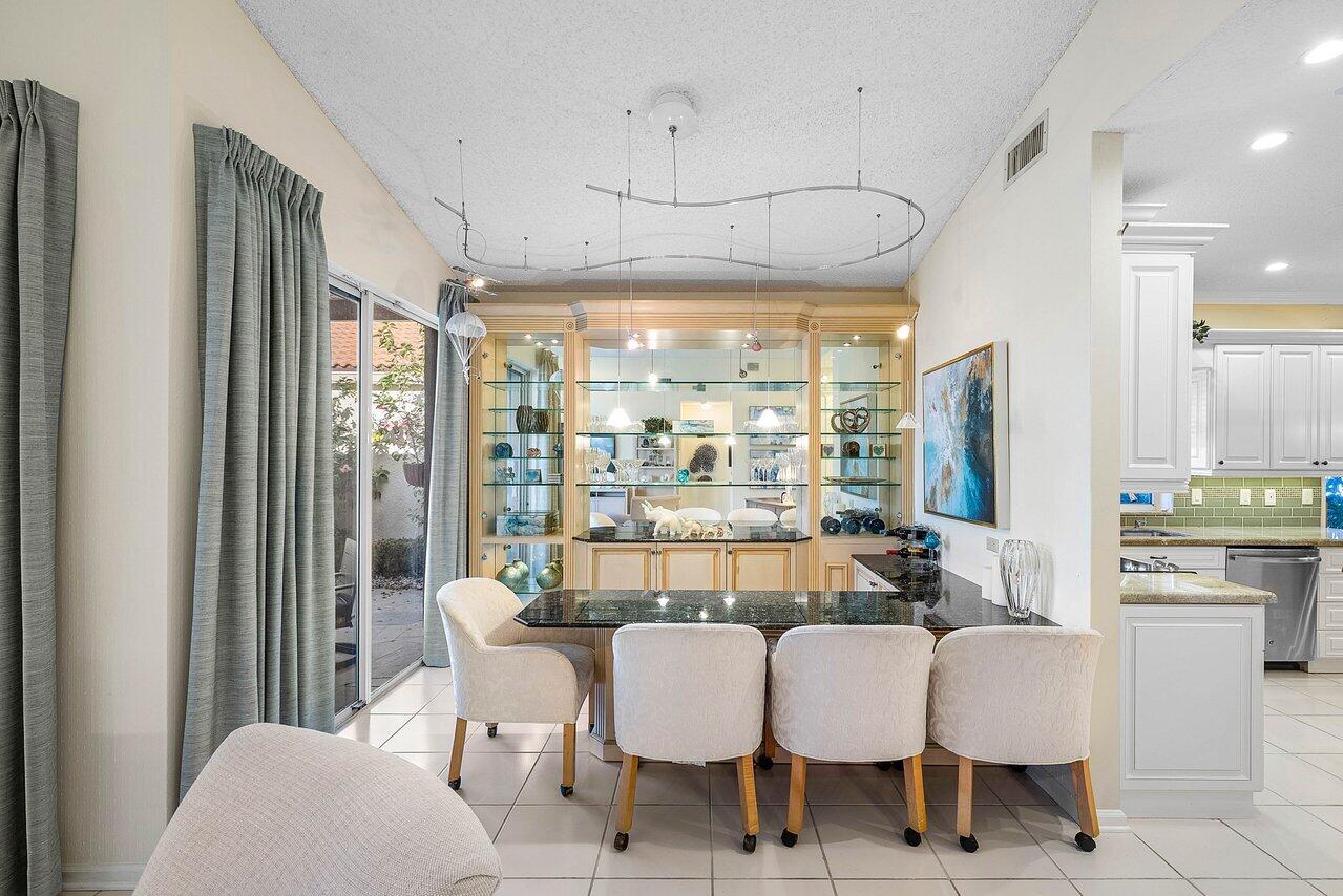 7155 Via Palomar Boca Raton, FL 33433 - Photo 9 of 45 a view of a dining room with furniture window and outside view