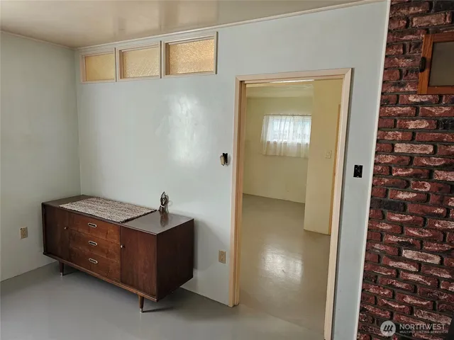 a view of a livingroom with furniture and a couch