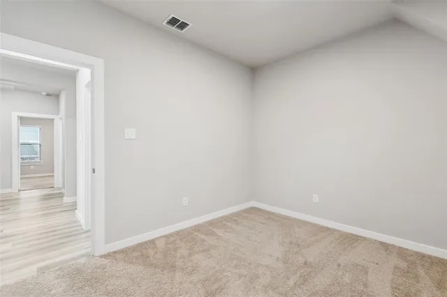 an empty room and windows