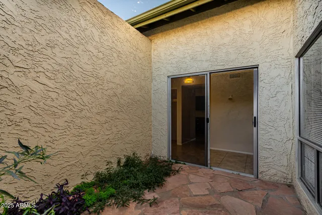 a view of a back yard of the house