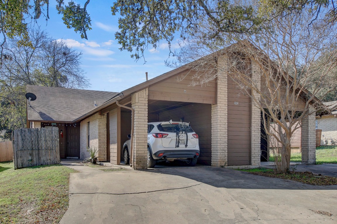 a car parked in front of a house