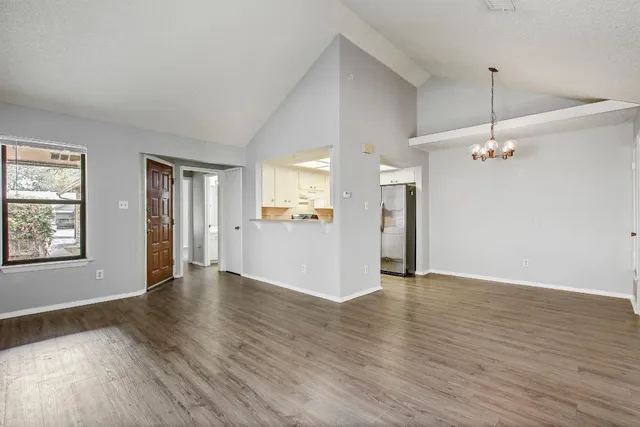 a view of a kitchen with a sink and a kitchen