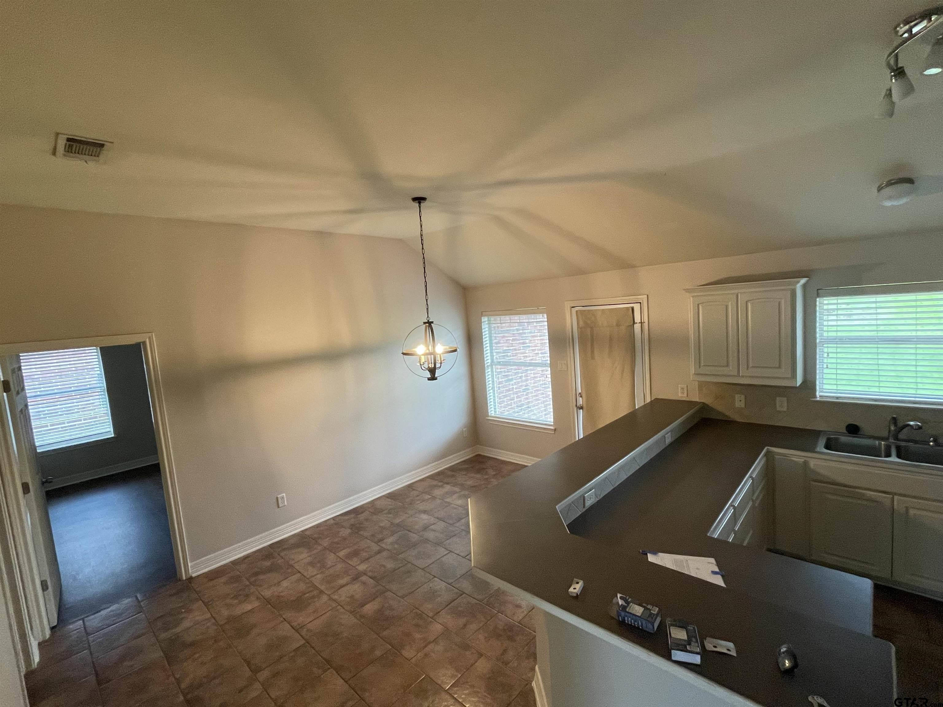 213 Cass Circle Tyler, TX 75703 - Photo 12 of 44 a view of a kitchen with a sink