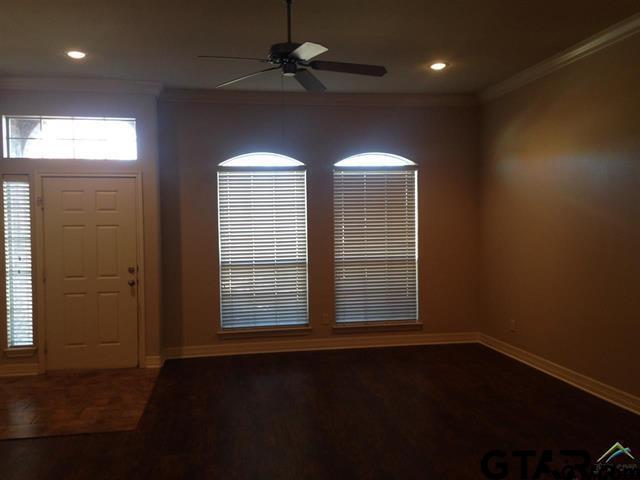 213 Cass Circle Tyler, TX 75703 - Photo 3 of 44 a view of empty room with wooden floor and fan