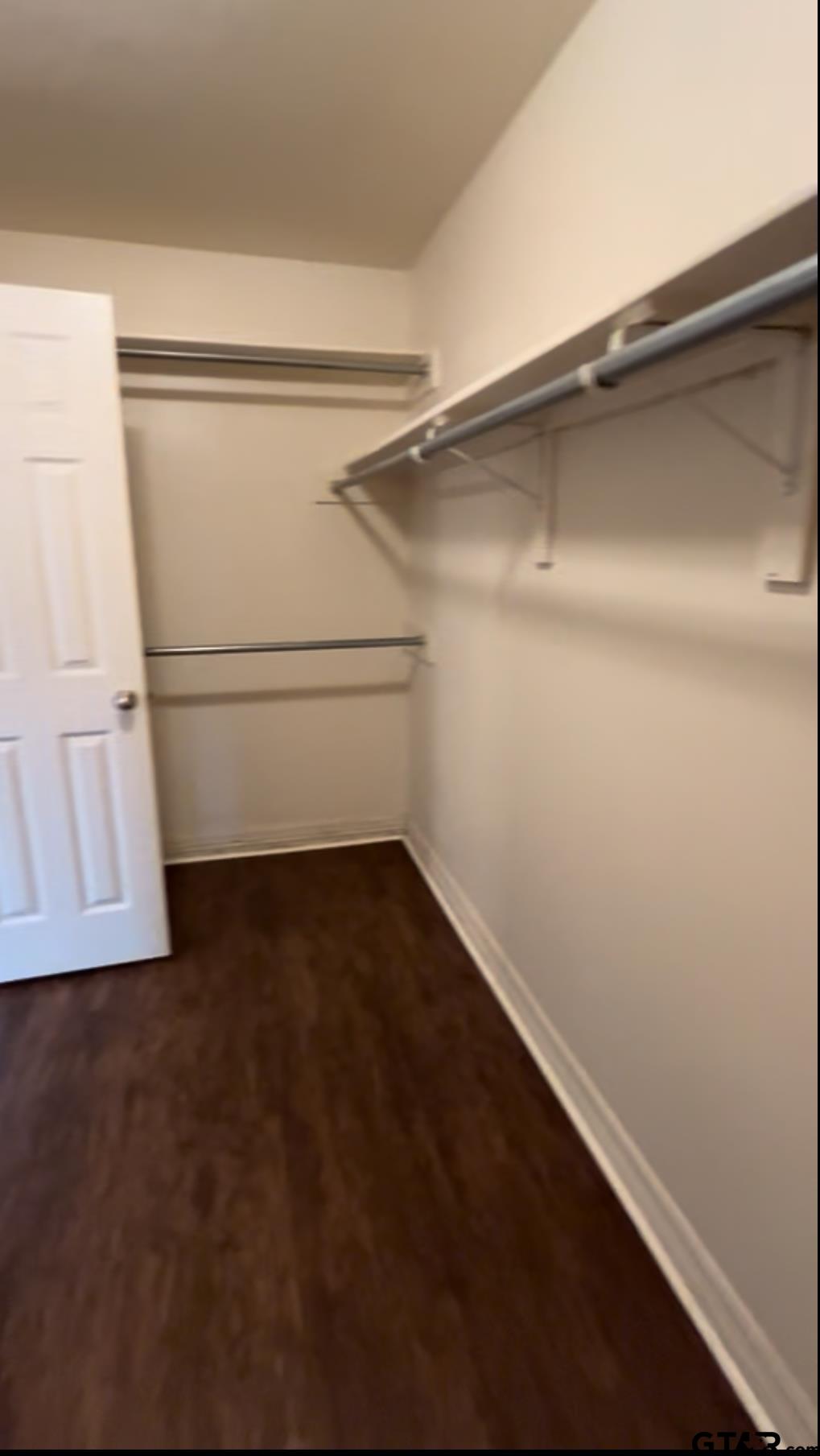 213 Cass Circle Tyler, TX 75703 - Photo 34 of 44 a view of an empty walk in closet