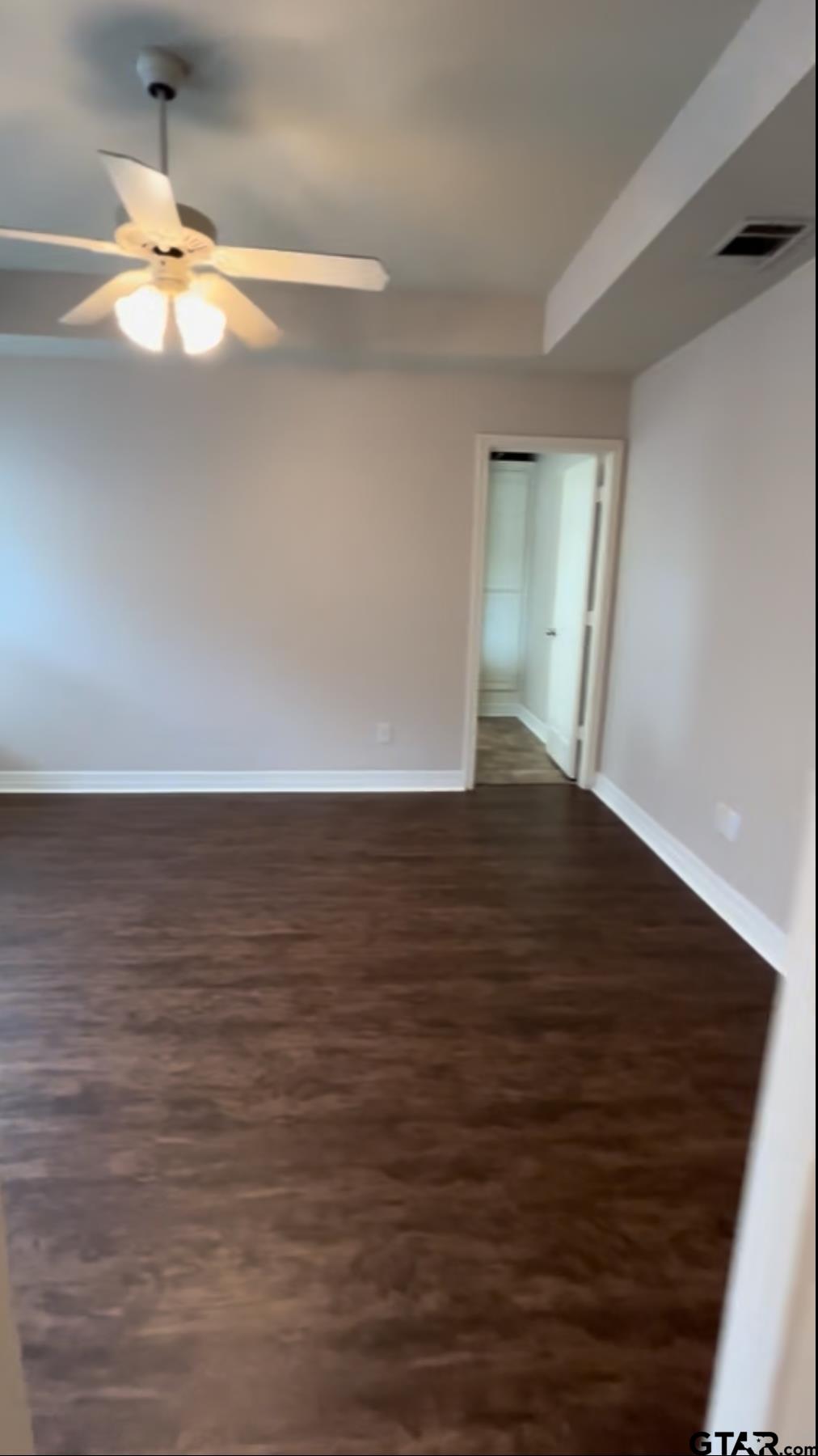 213 Cass Circle Tyler, TX 75703 - Photo 36 of 44 a view of wooden floor and cabinet in a room