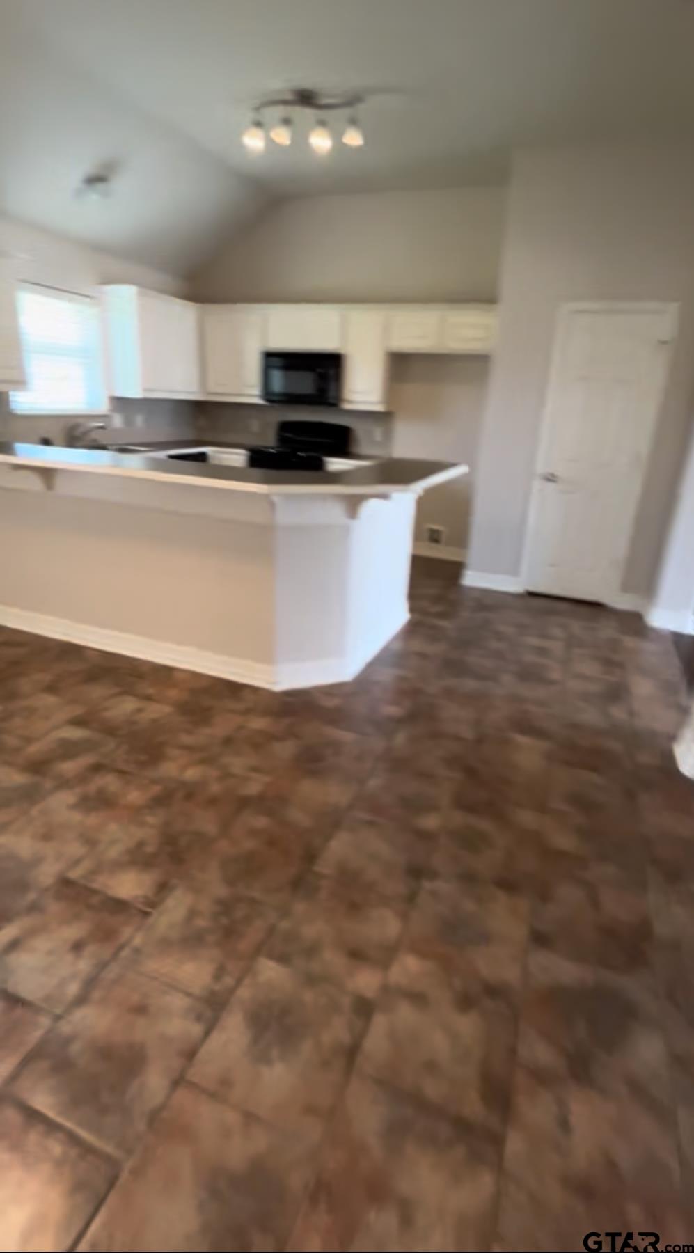213 Cass Circle Tyler, TX 75703 - Photo 41 of 44 a view of kitchen with stainless steel appliances granite countertop a sink and a stove