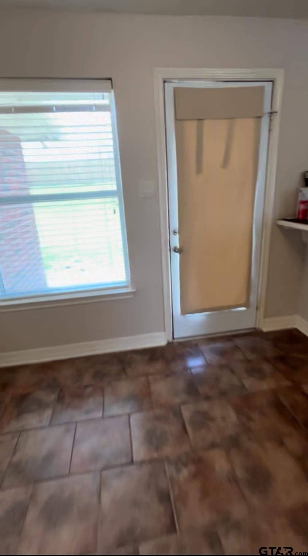 213 Cass Circle Tyler, TX 75703 - Photo 43 of 44 a view of an empty room with a window